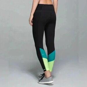 NWOT Lululemon Trail Bound 7/8 Tight Black / Blue Tropics / Clear Mint green